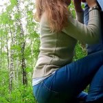 Cute girl does risky blowjob in public park