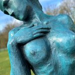 Elegant blue bronze statue of a nude woman on marble base
