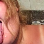 Huge cumshot on the face of a hot BBW cutie with big boobs in the shower after a perfect blowjob