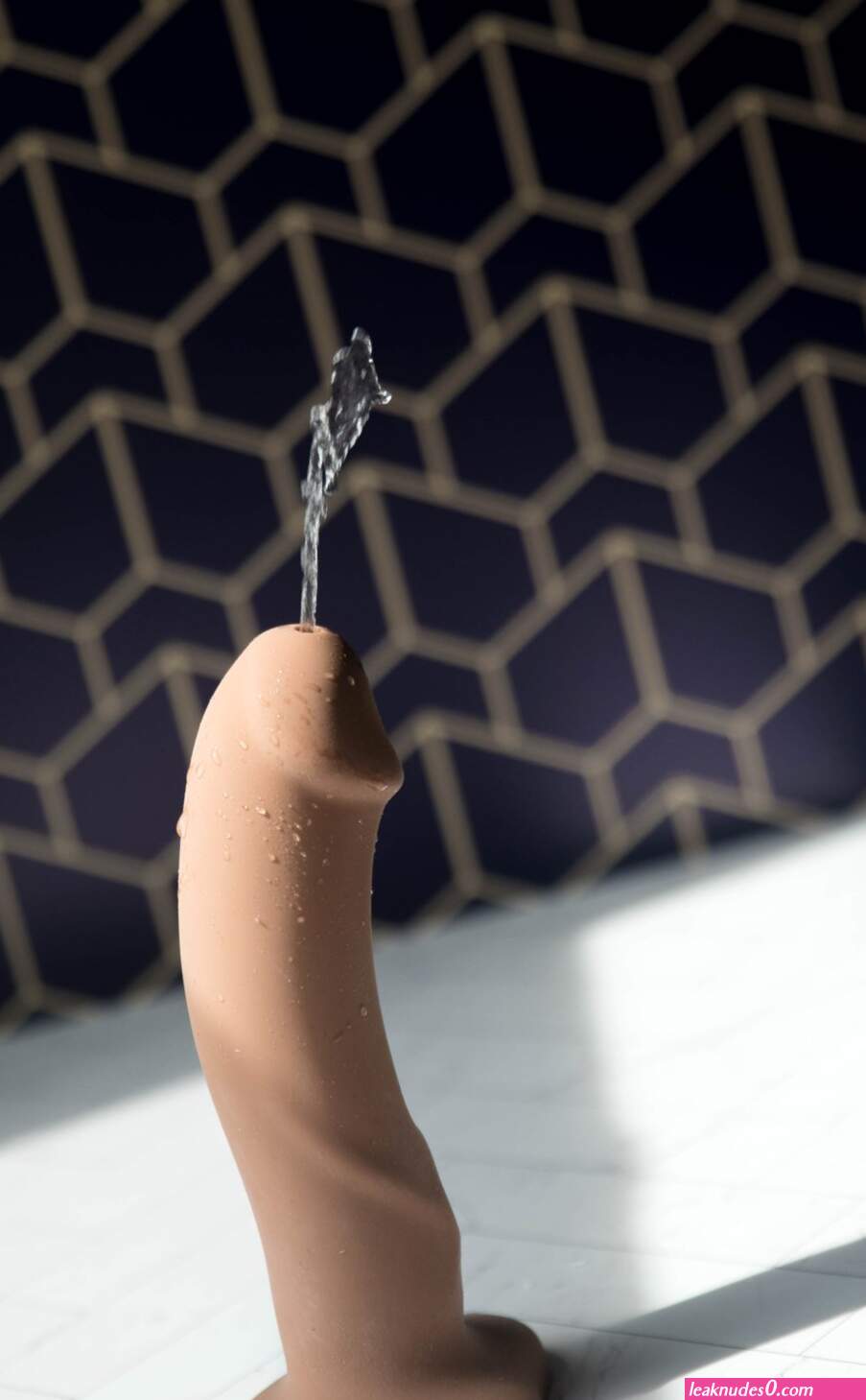 Playing with a dildo (photos)